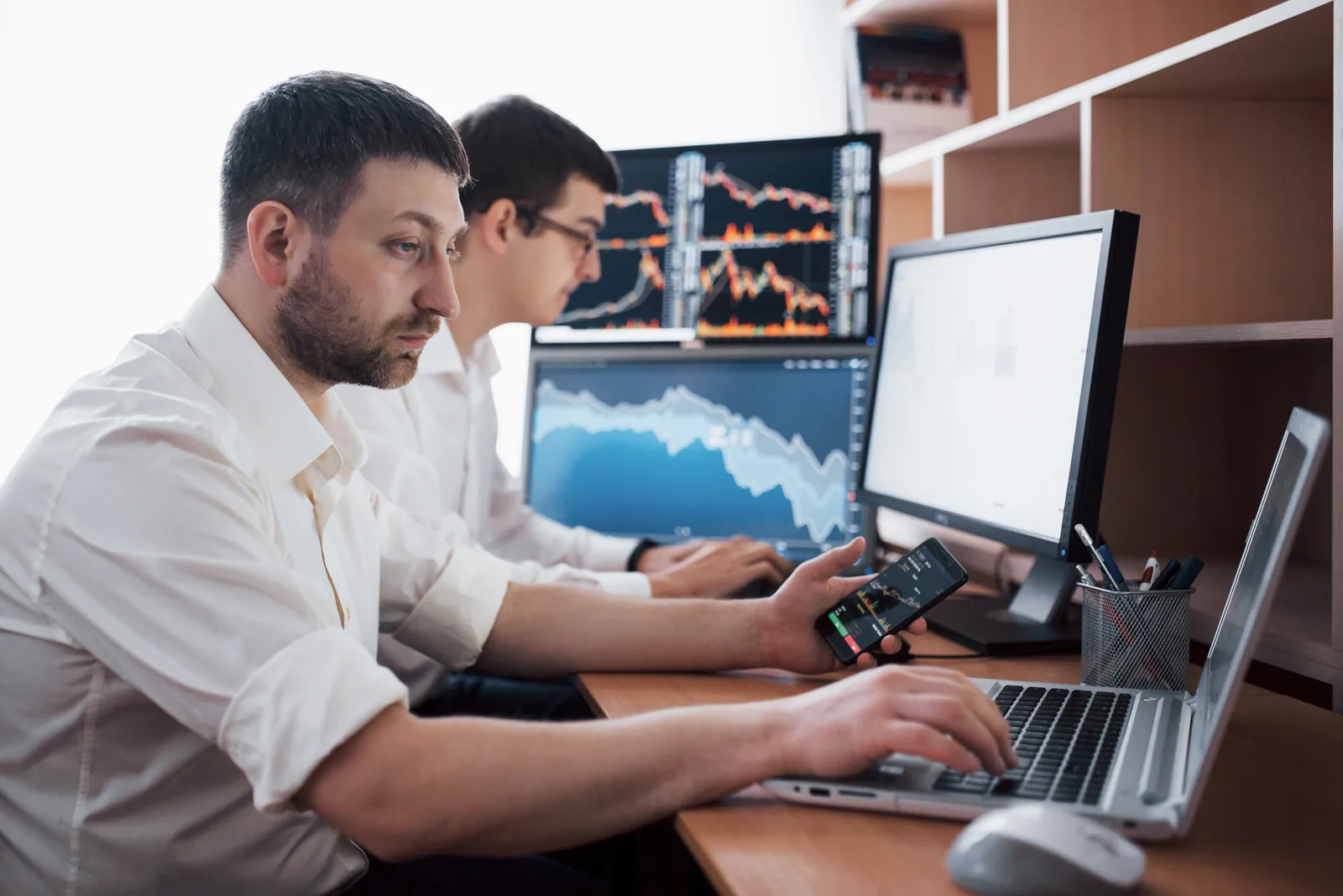 Analysts comparing core banking screens side by side