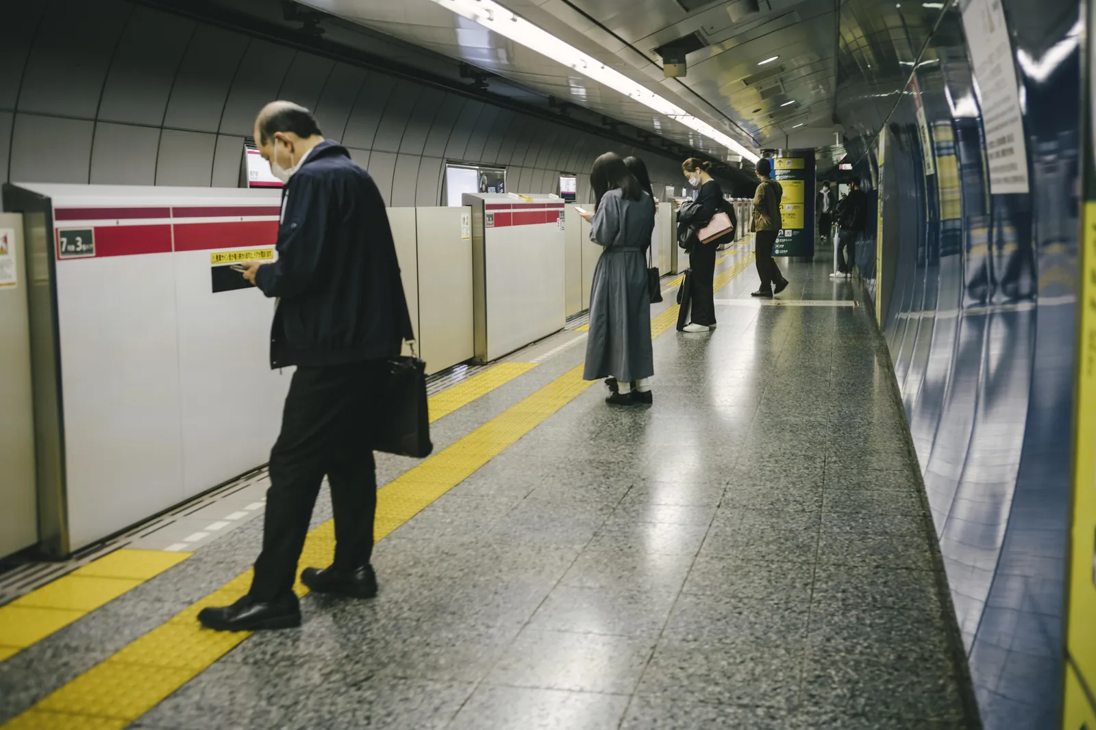 Commuters on a metro platform