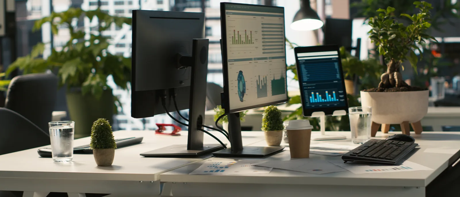 Quiet workspace with performance dashboards on several monitors