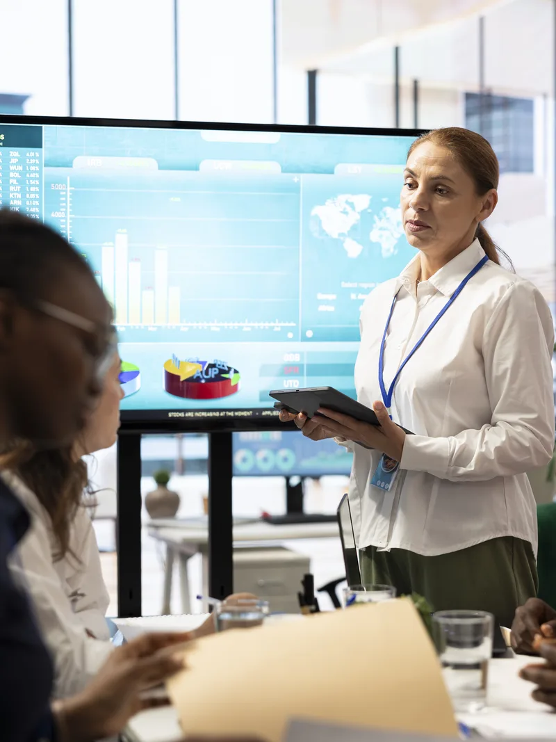 Joined-up team reviewing one shared quality dashboard