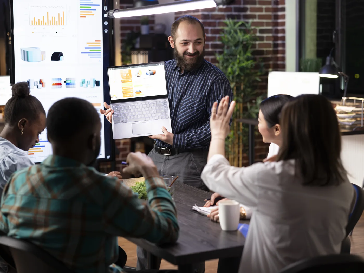 Test manager coordinating multiple teams