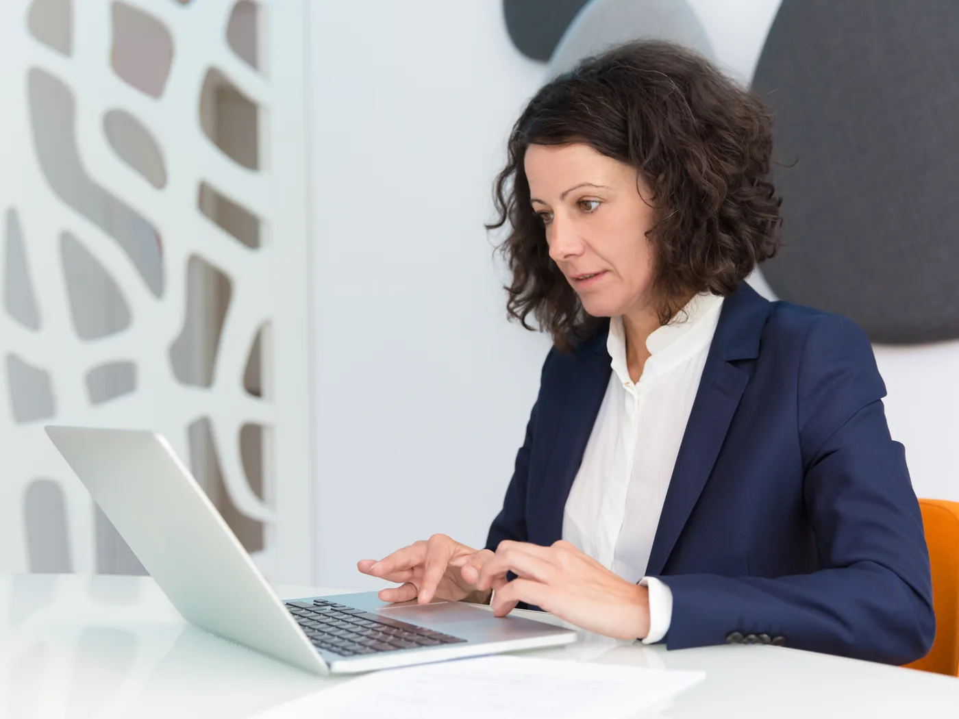 Business user reviewing test evidence on a laptop
