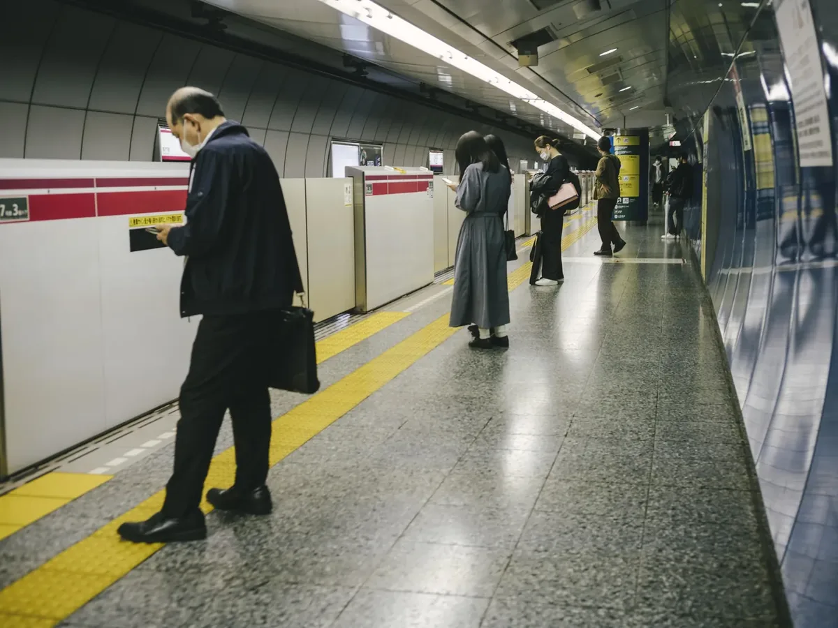 Commuters on a metro platform