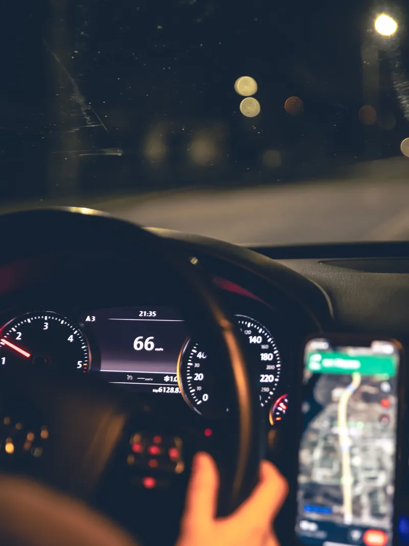 Driver's dashboard and navigation screen at night
