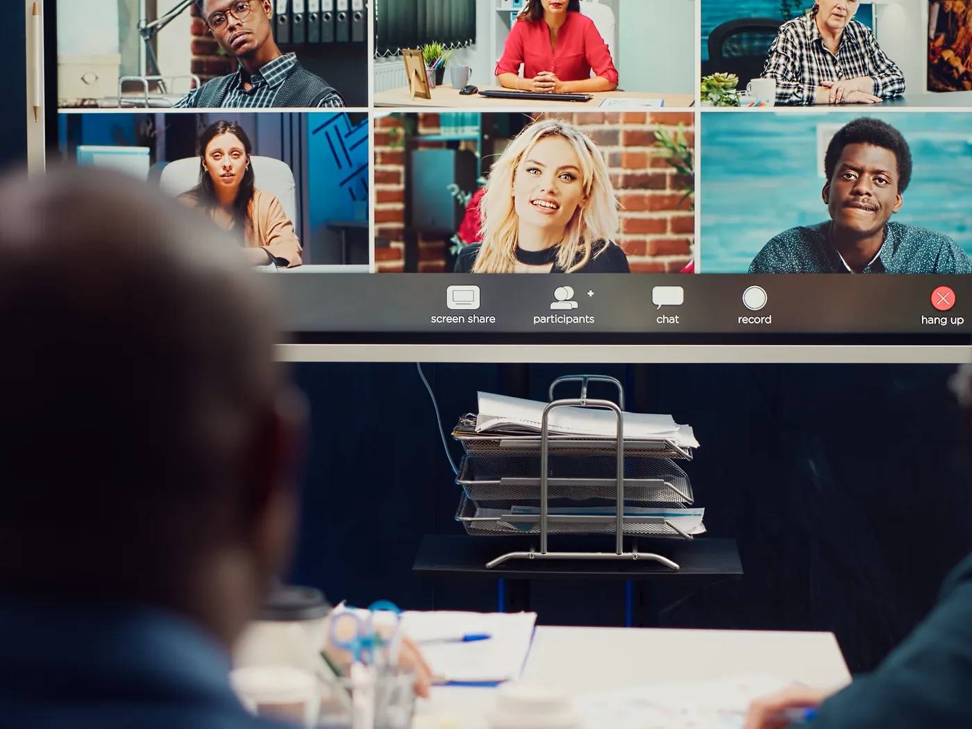 Team meeting remote colleagues on a large video call