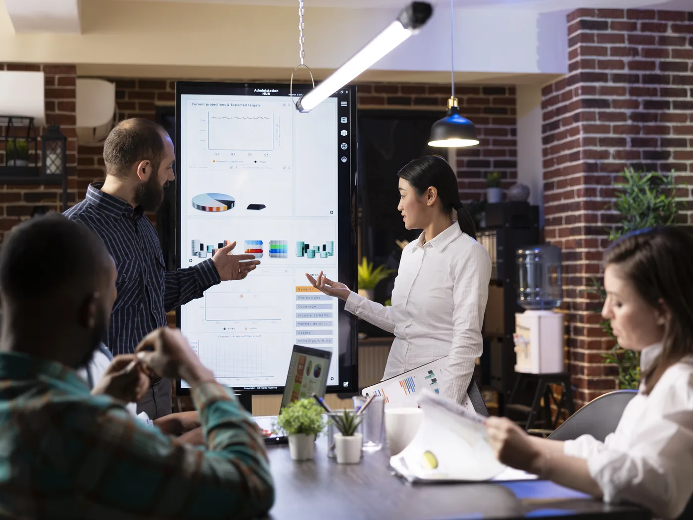 Team reviewing a release plan on a digital screen